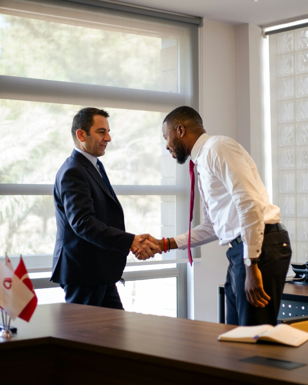 Diverse team of insurance professionals collaborating in a meeting room
