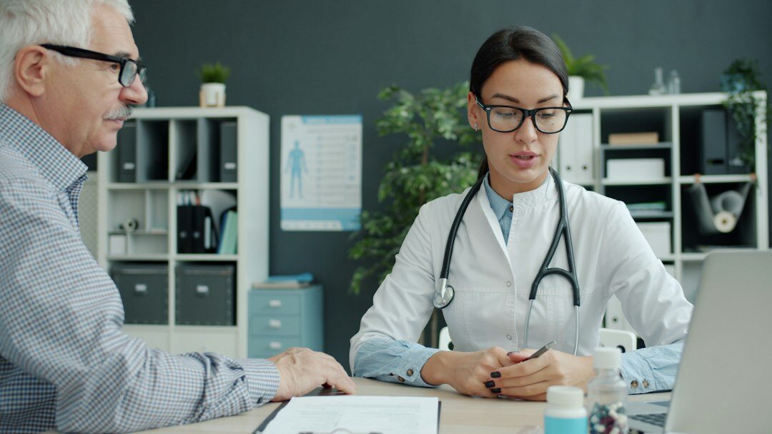 health insurance advisor with client